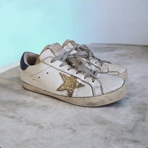 Golden Goose Women's White and Gold Star Sneakers